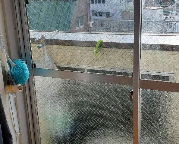 ベランダ掃き出し窓の霞菱ワイヤー交換|文京区の施工写真